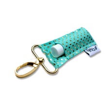 Load image into Gallery viewer, Gold Dots on Aqua LippyClip® Lip Balm Holder