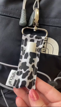 Load image into Gallery viewer, Cow Print LippyClip® Lip Balm Holder