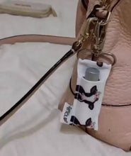 Load image into Gallery viewer, Cow with Flower Crown LippyClip® Lip Balm Holder