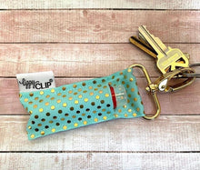 Load image into Gallery viewer, Gold Dots on Aqua LippyClip® Lip Balm Holder