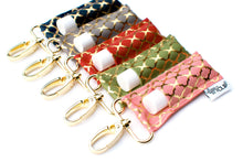 Load image into Gallery viewer, Gold Quatrefoil on Charcoal LippyClip® Lip Balm Holder